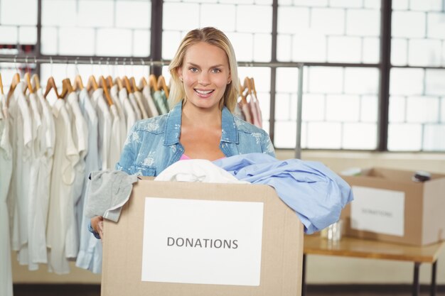 Portrait of cheerful woman volunteer 