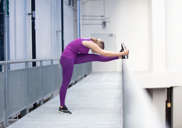 Portrait of cheerful women with sportswear doing yoga pose at outdoor