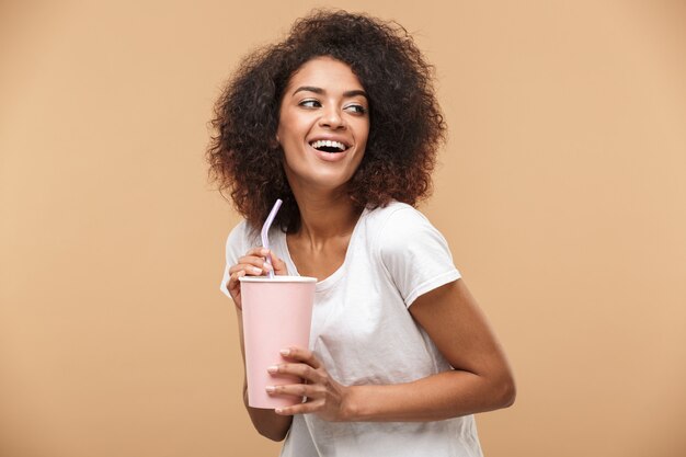 Portrait of a cheerful young african woman