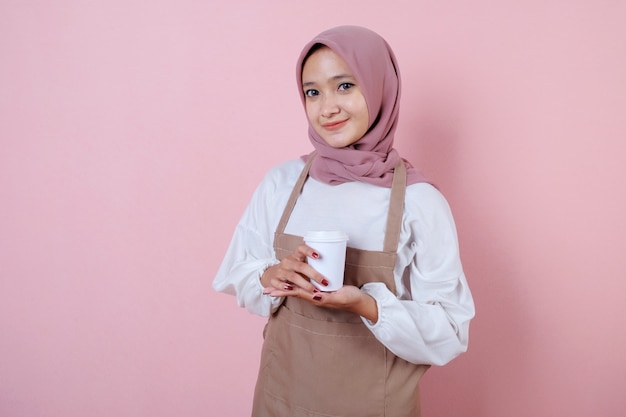 Portrait cheerful young asian woman with white cup or glass