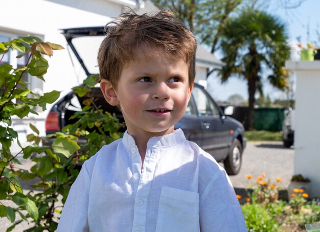 A portrait of cheerful young boy, outdoor