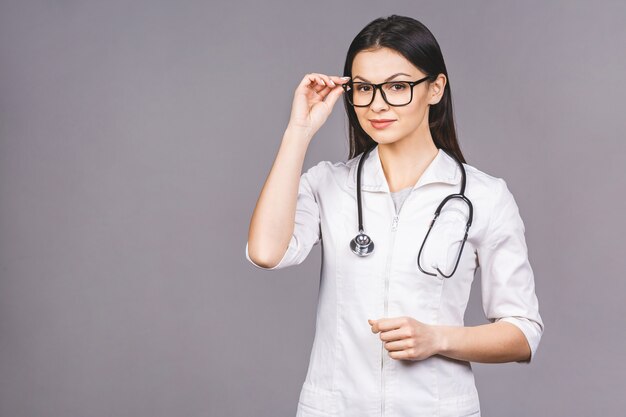 Portrait of cheerful young female doctor with stethoscope over neck 