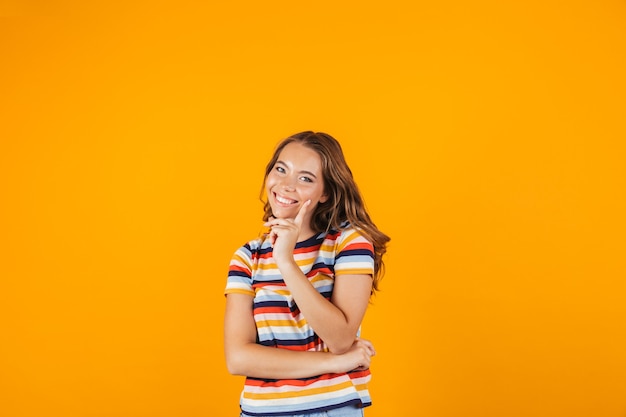 Portrait of a cheerful young girl standing