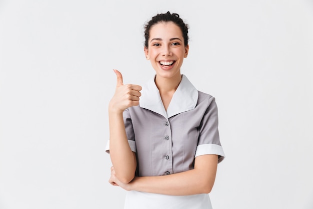 Portrait of a cheerful young housemaid