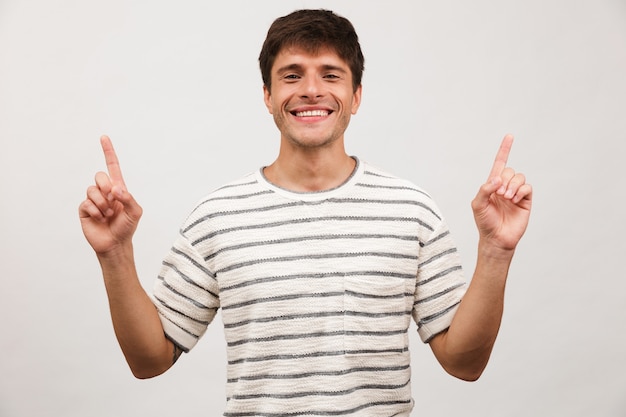 Portrait of a cheerful young man standing