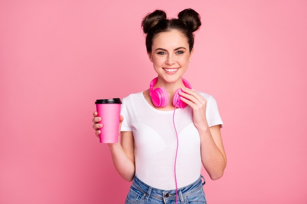 Portrait of cheery girl listen music drink hot latte chocolate cappuccino 