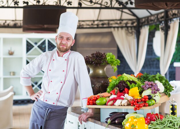 Portrait of a Chef with vegetables.