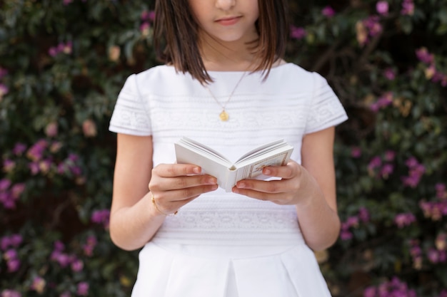 Portrait of child getting ready for their first communion