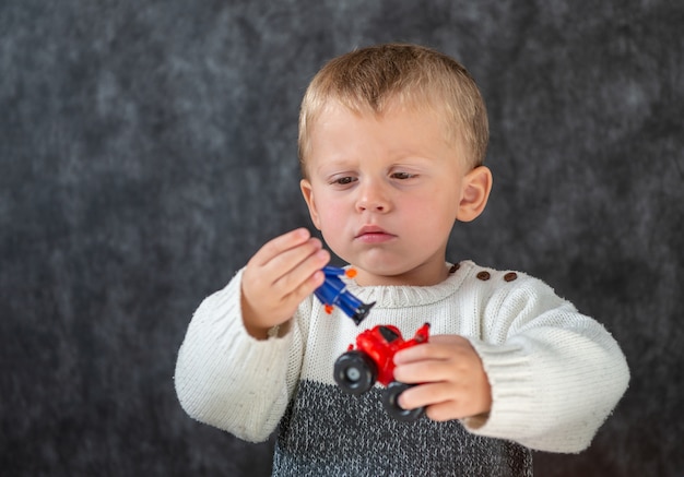 Portrait of child two years old playing