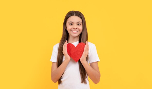 Portrait of child with heart happy valentines day be my valentine teen girl