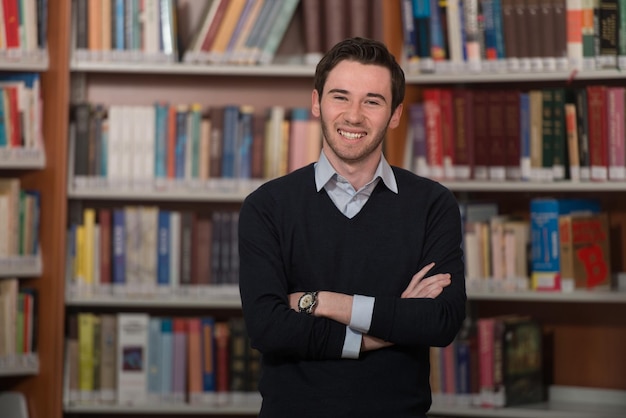 Portrait Of Clever Student In College Library  Shallow Depth Of Field