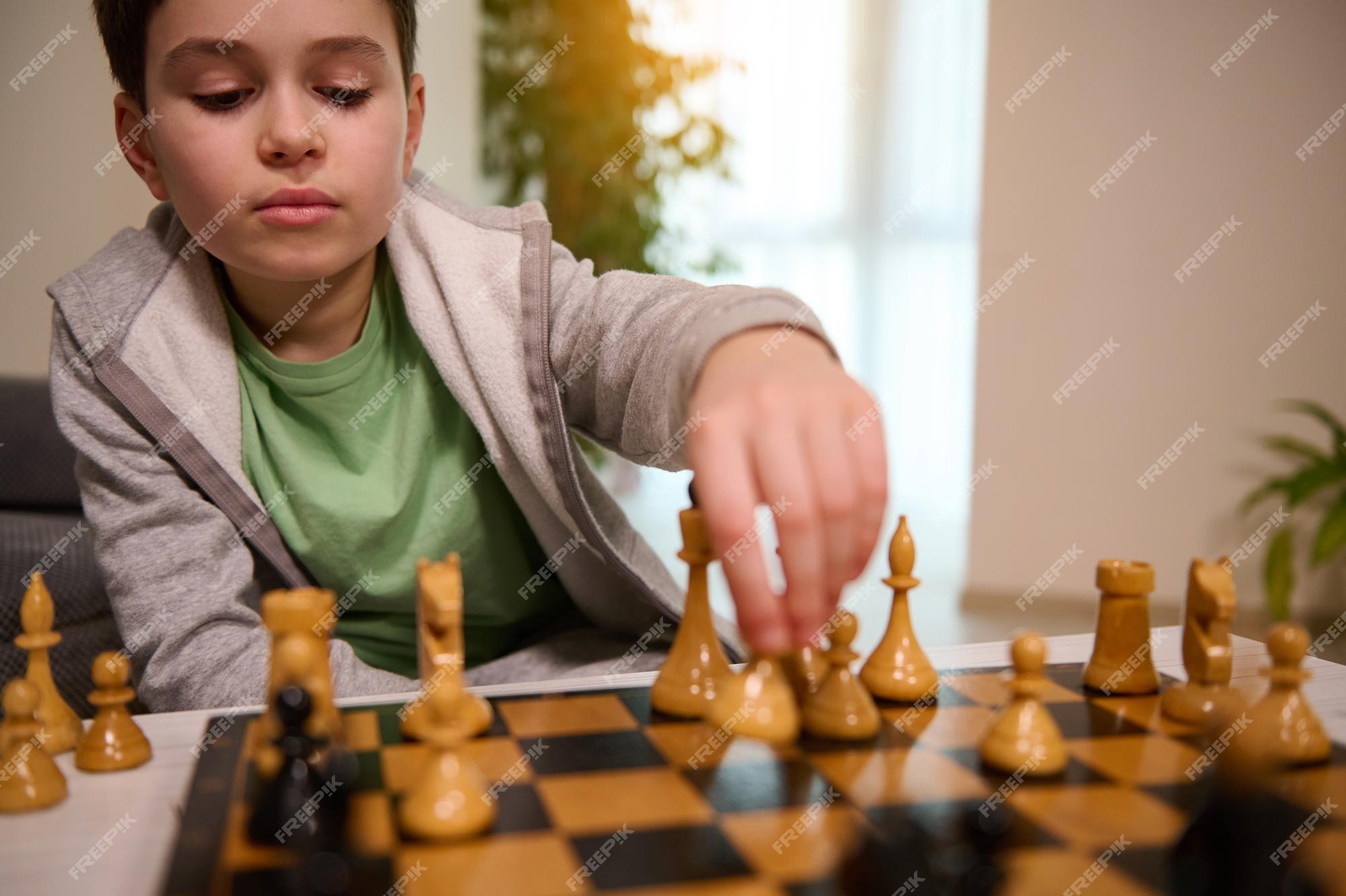 Handsome Male Model Considers His Next Chess Move Stock Photo - Download  Image Now - Chess, Chess Piece, Contemplation - iStock