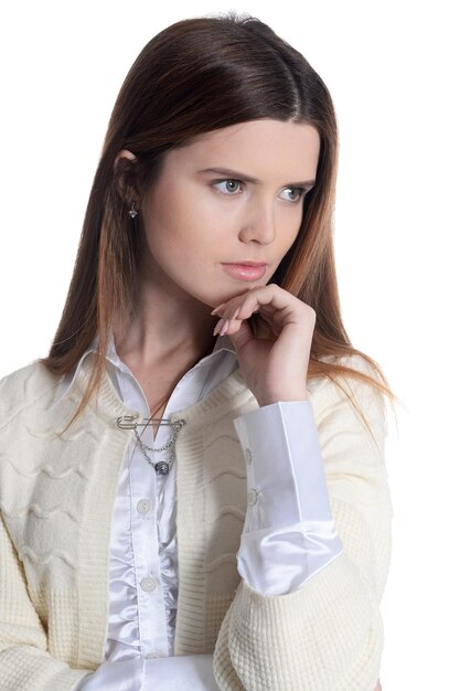 Portrait of confident beautiful young woman posing on white background