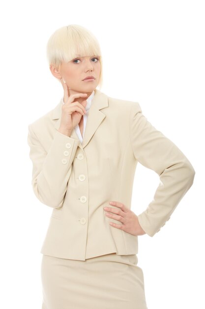 Portrait of confident businesswoman standing against white background