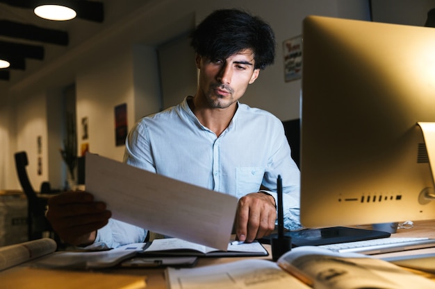 Portrait of a confident concentrated businessman working