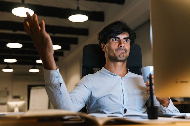 Portrait of a confident concentrated businessman working