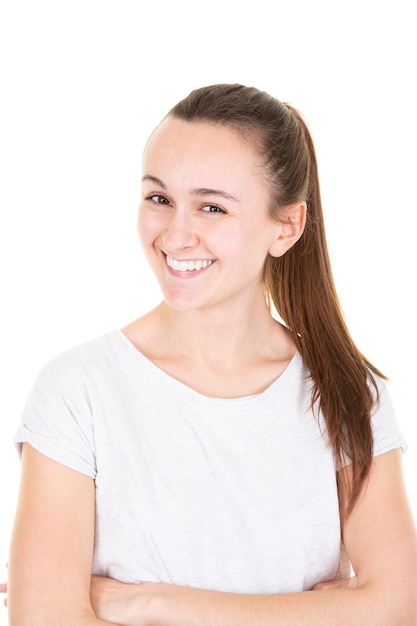 Portrait of confident fit girl in gym outfit standing under white background