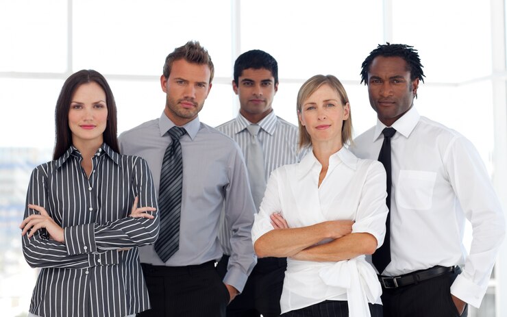 Photo portrait of a confident group of business people looking at the camera