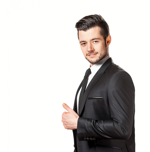 Photo portrait of confident handsome man in black suit with bowtie