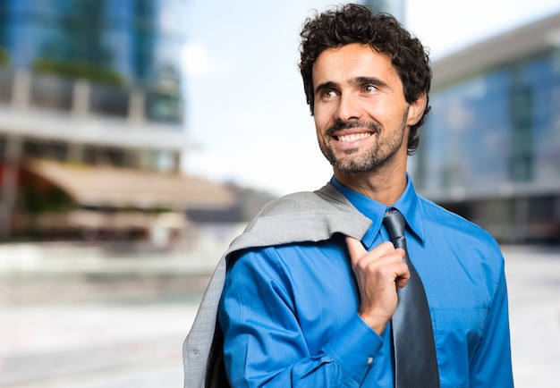 Portrait of a confident manager in an urban setting