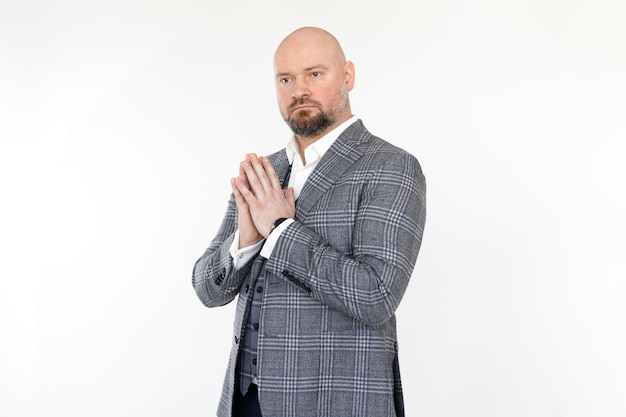 Portrait of confident middleaged businessman wearing grey checkered jacket vest white shirt standing