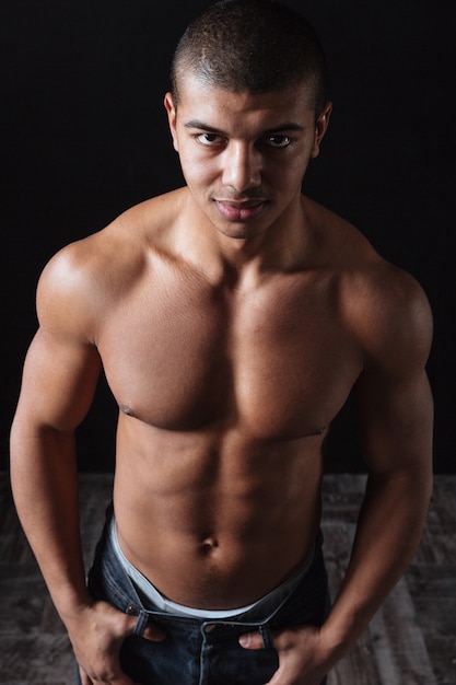 Portrait of confident muscular african american young man