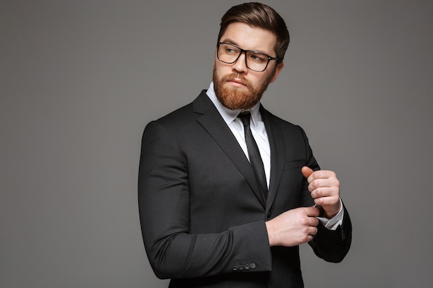 Portrait of a confident young businessman dressed in suit