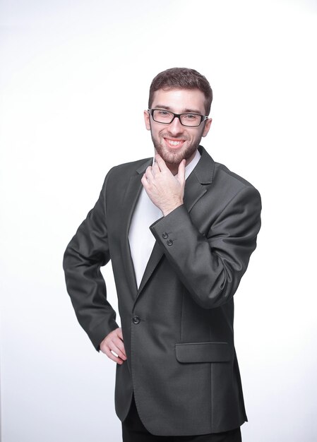 Portrait of a confident young businessmanisolated on white