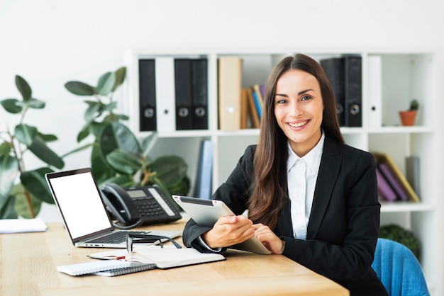 Portrait of a confident young businesswoman in the modern office