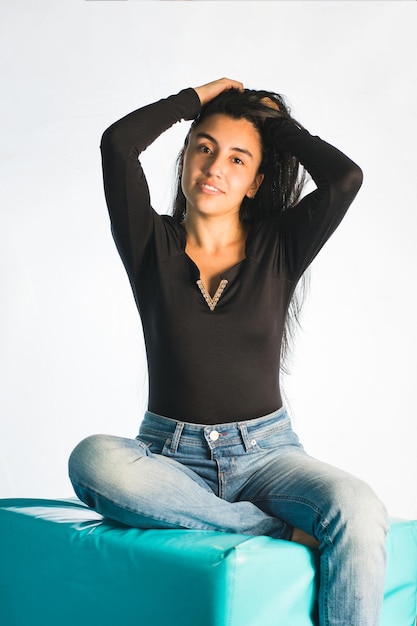 Portrait of a confident young colombian woman. Pretty girl feel comfortable