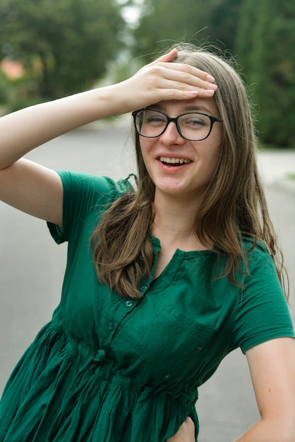 Portrait of confident young girl with eyeglasses