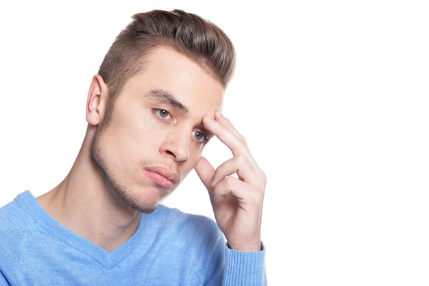 Portrait of confident young man isolated on white background