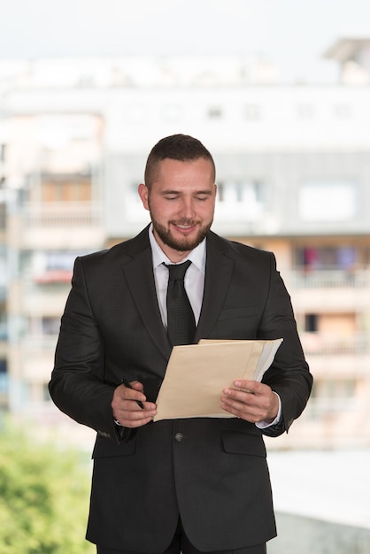 Portrait Of Construction Master With Blueprint In Hands