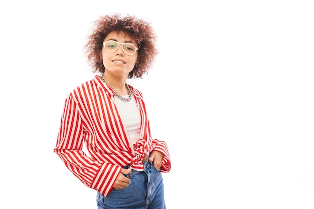 Portrait of cool happy kazakh model girl with curls and chain posing and smiling isolated on white studio backgroundxA