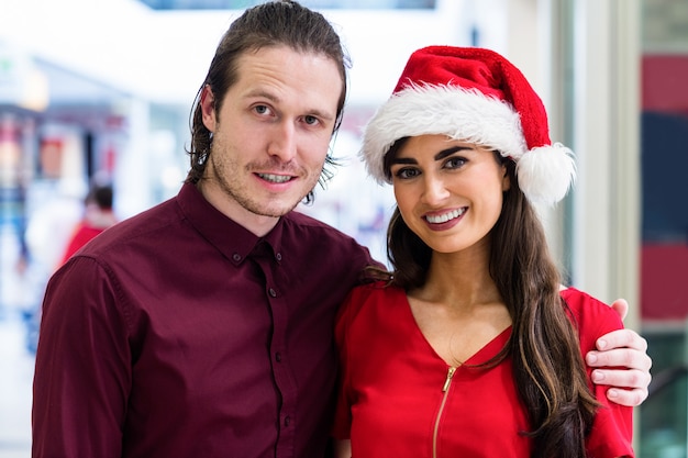 Portrait of a couple in Christmas attire