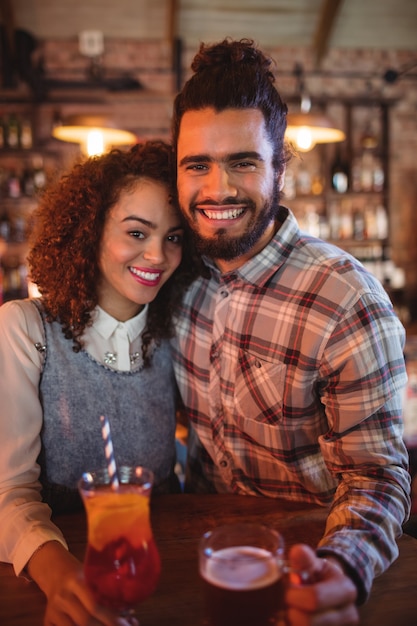 Portrait of couple embracing each other