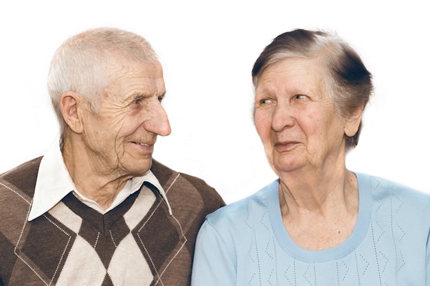 Portrait of  couple grandparents on a white background