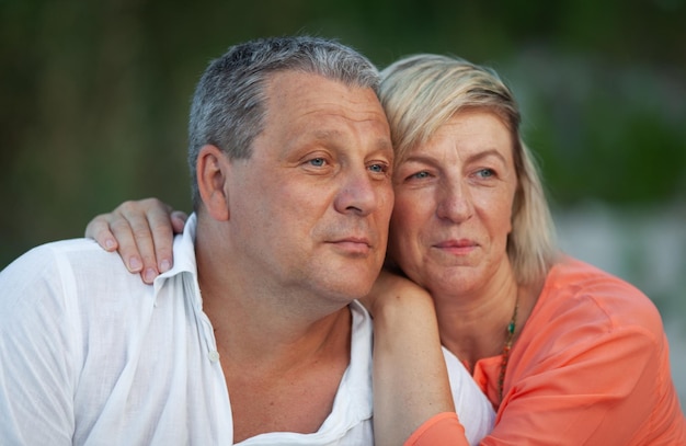 Portrait of couple kissing outdoors