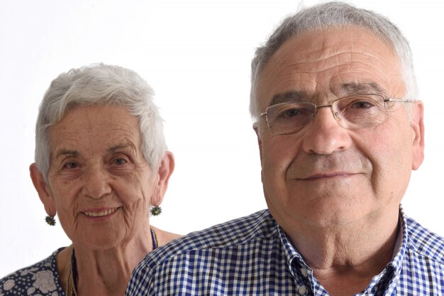 Portrait of a couple senior on white