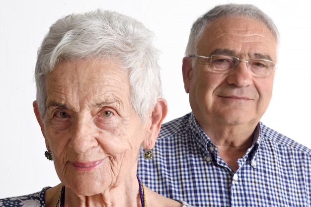 Portrait of a couple senior on white