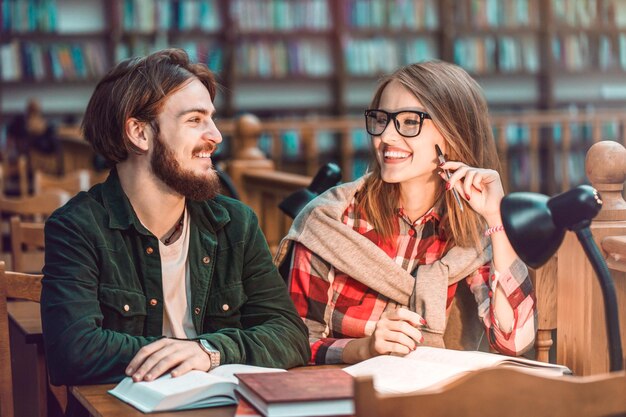 Portrait of Couple of Students in Library