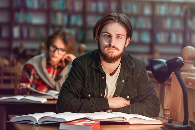 Portrait of Couple of Students in Library