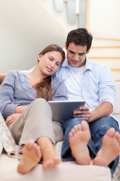 Portrait of a couple using a tablet computer