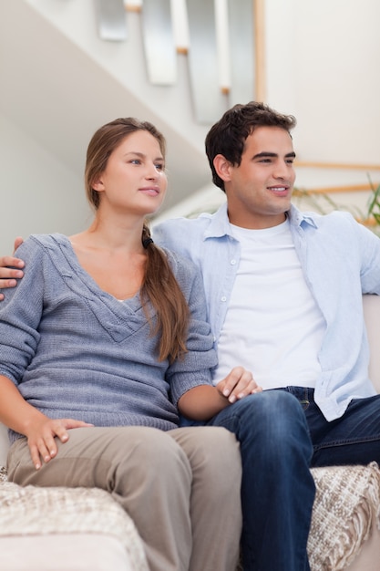 Portrait of a couple watching a movie