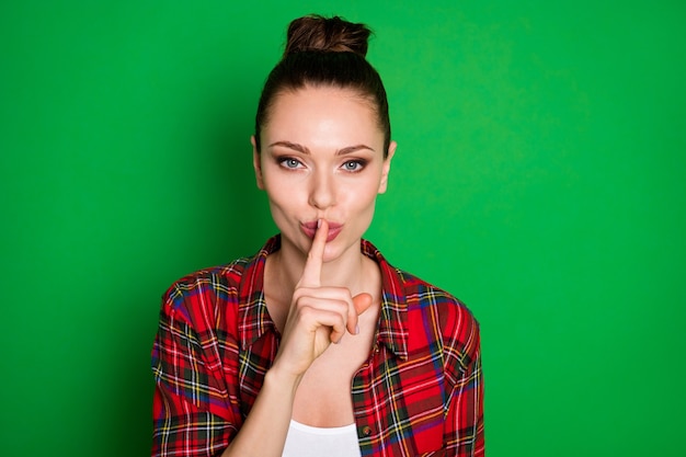 Photo portrait of cunning sly girl plan ask her friend dont tell anyone taboo information put index finger lips wear good look clothes isolated over shine color background