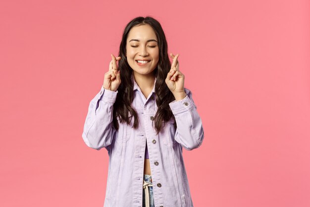 Portrait of curious good-looking asian girl