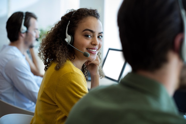 Photo portrait of customer service executive working at office