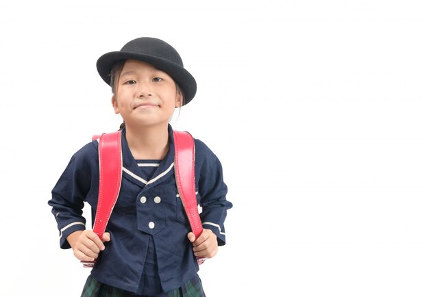 Portrait of cute asian girl student with backpack isolated on white