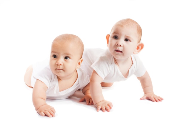 Photo portrait of cute baby against white background