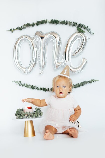 Photo portrait of cute baby boy standing against white background